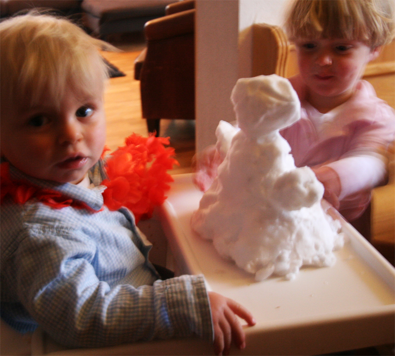 Sneeuwpop de Berghut Rauris Oostenrijk kinderen wintersport